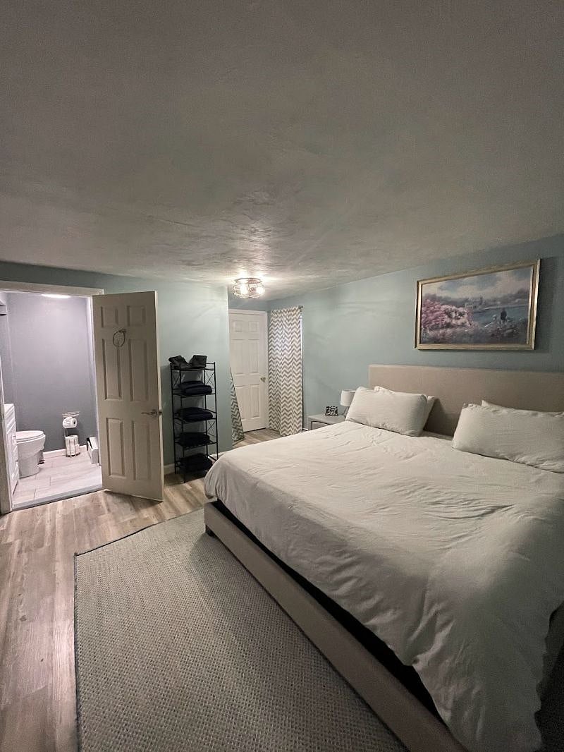 Large downstairs bedroom w/ desk, two closets and ensuite bath