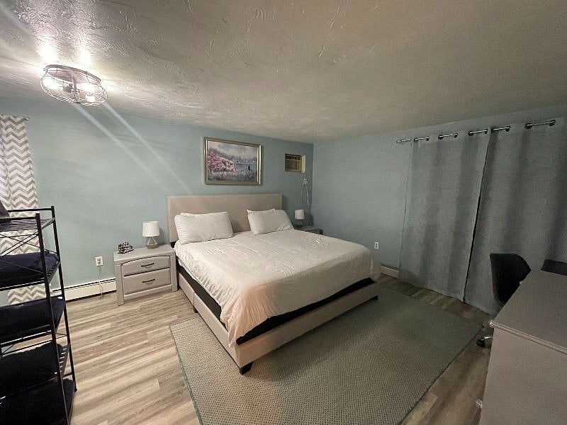 Large downstairs bedroom w/ desk, two closets and ensuite bath