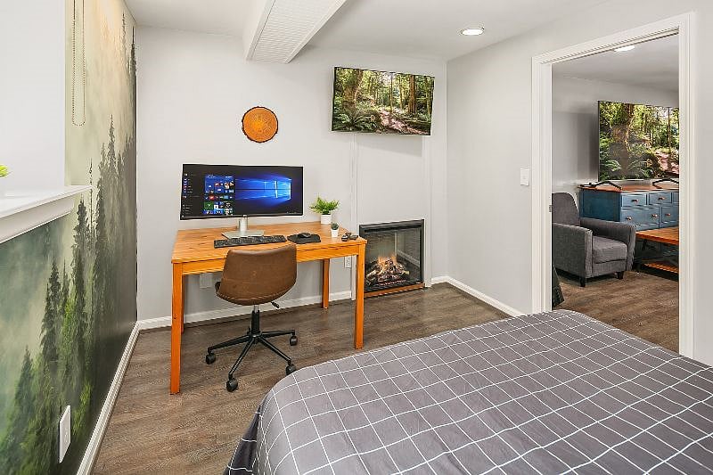 Bedroom #1

- Queen size bed with Leesa Mattress

- Workstation with 34" Dell monitor, desk, keyboard, mouse, surge protector/power strip, and High-Speed 1GBPS WIFI.

- 40" Samsung Smart TV (wall mounted)

- Electric Fireplace

- Spacious closet