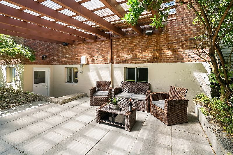 Your private covered back patio is the perfect place to relax regardless of the weather.  It has garden views of our large, beautifully landscaped backyard.  Our backyard is a shared space where you might encounter myself and other guests.