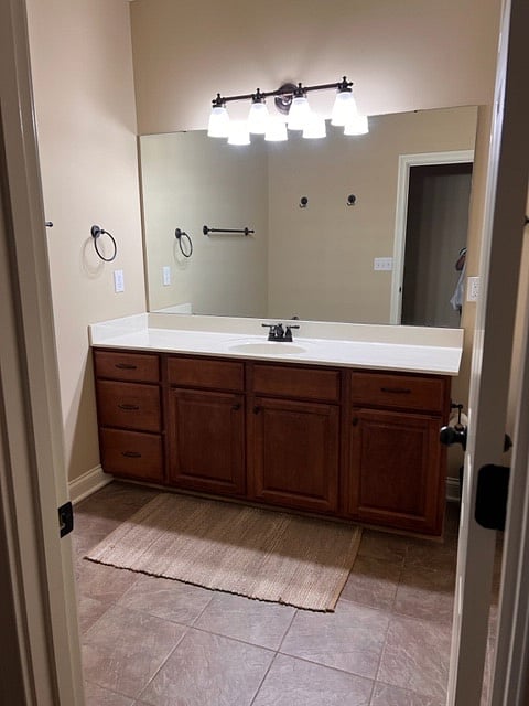 bathroom right out side the door of 2nd bedroom. 1 sink and Tub/shower combo