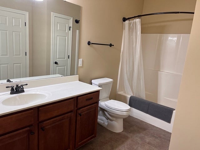 bathroom right out side the door of 2nd bedroom. 1 sink and Tub/shower combo