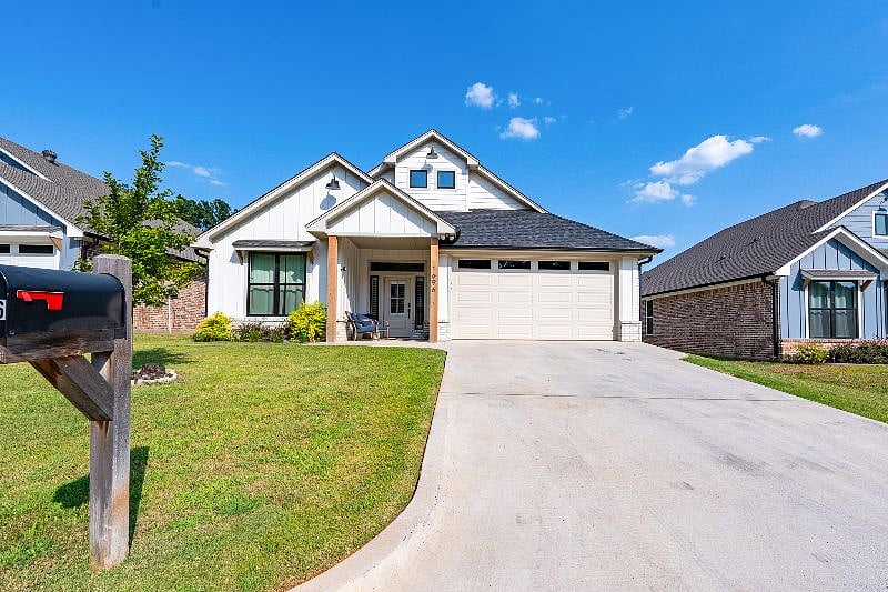 in a recently constructed community. Street leads to cul-de-sac. Front porch perfect for watching kiddos play in the front.