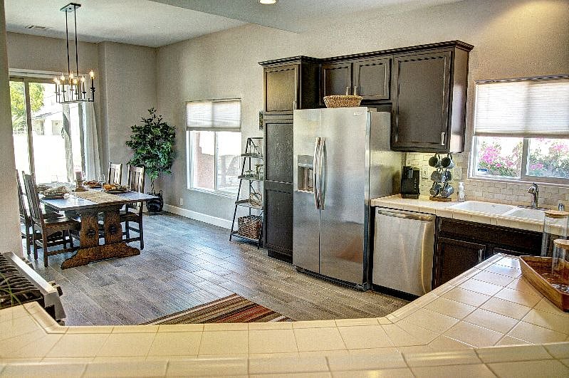 Well-stocked kitchen with new appliances