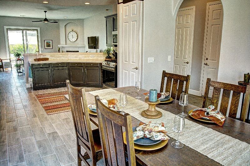 Open floor plan from pool to patio with tons of natural light and tall ceilings