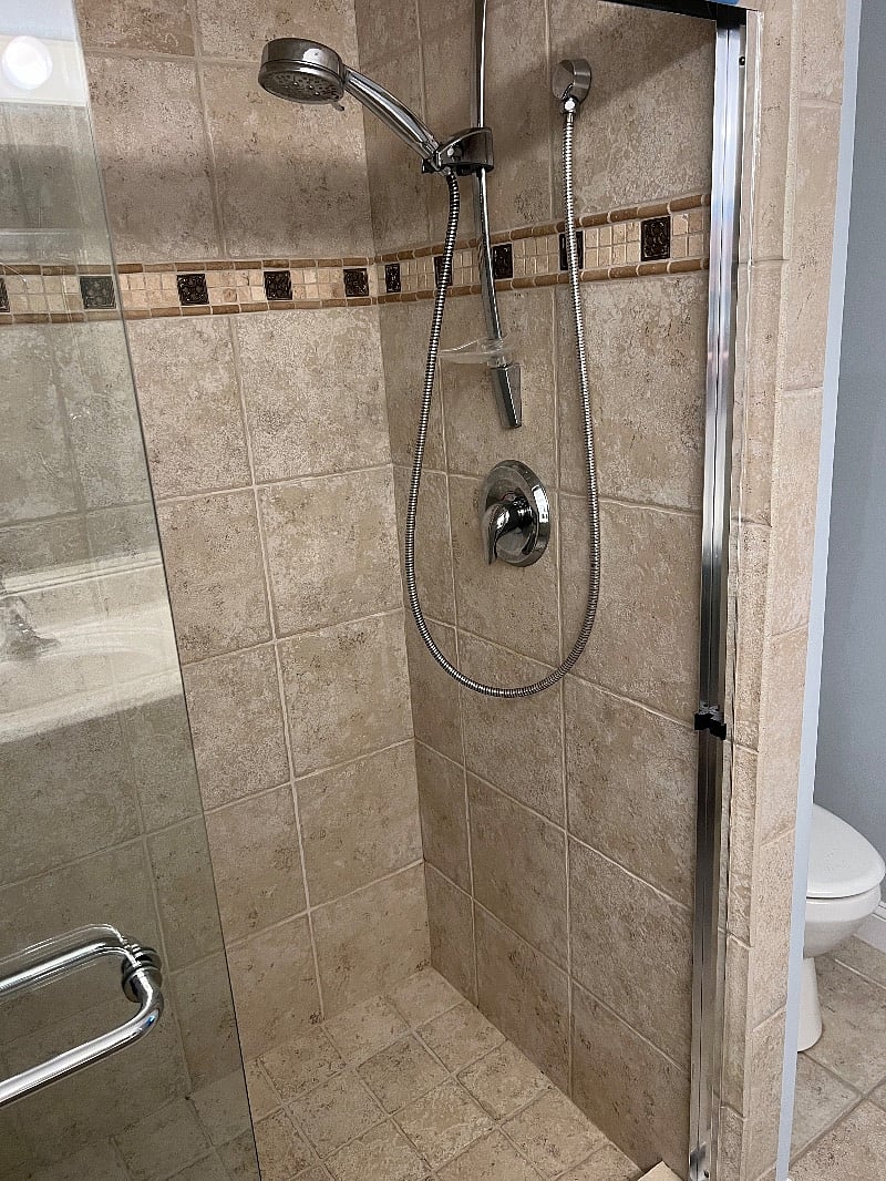 Extremely Nice tile shower in front bedroom.