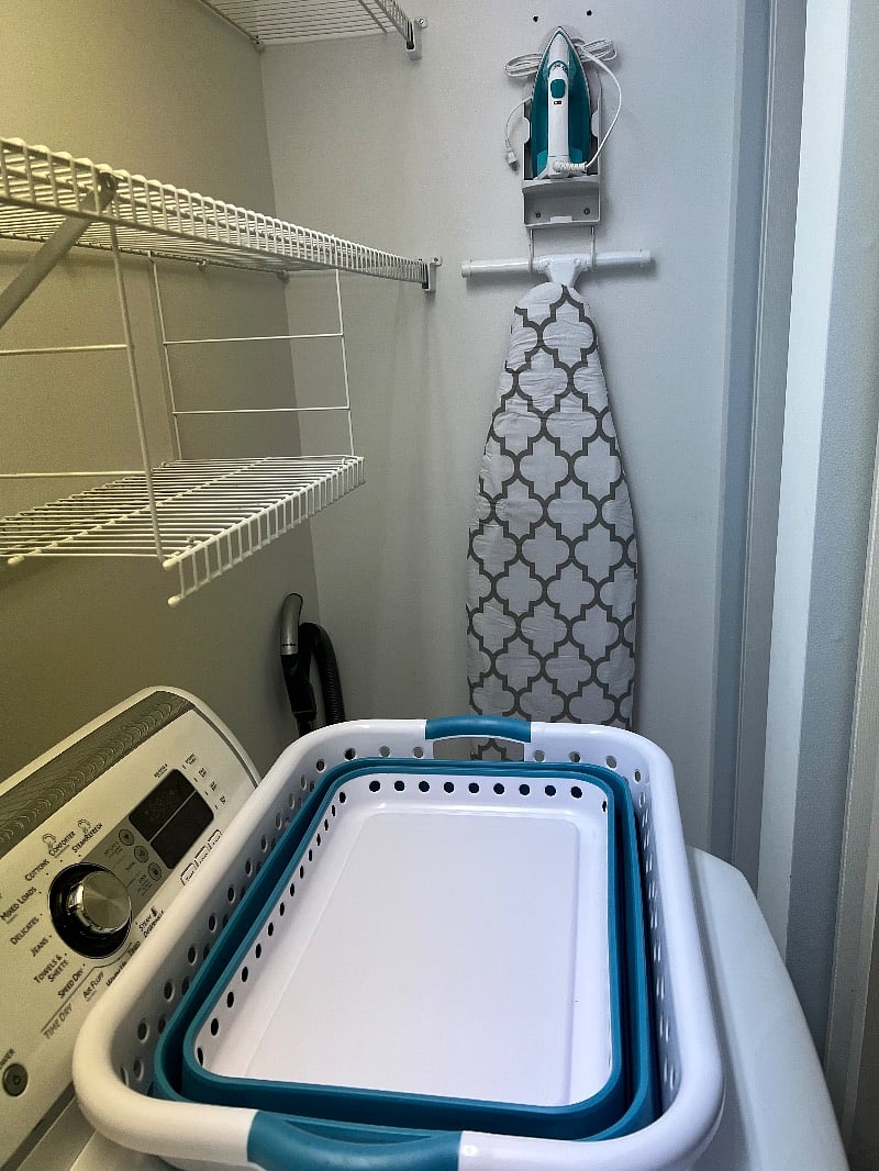 New iron and ironing board with new cover too!
The laundry basket is so nice! It is collapsible for easy of storage.The washers and dryer are wonderful Maytag Im pretty sure.