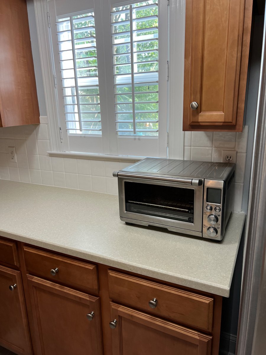 Breville toaster oven.
Kitchen window