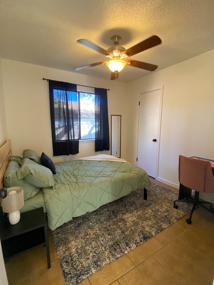 Bedroom 2, Full Bed + Desk. Curtains have since been upgraded to blackout