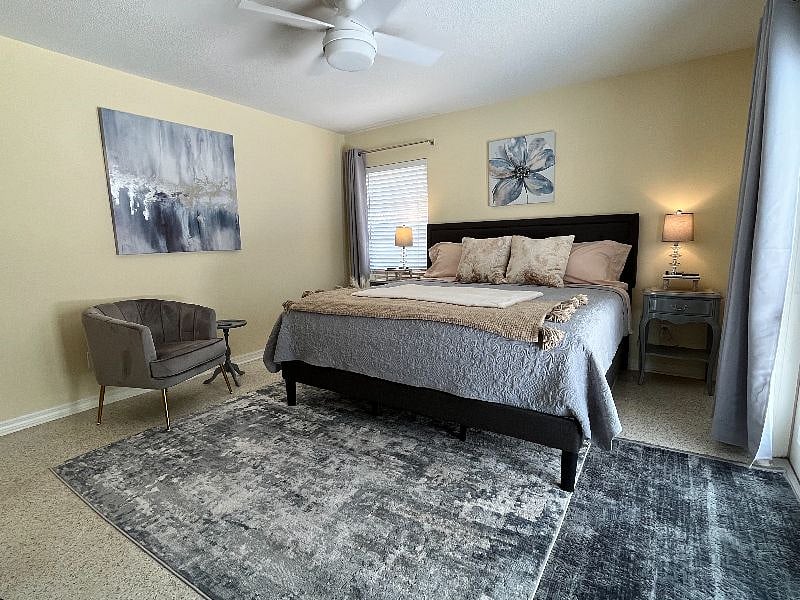 A plush gray barrel chair is perfect for unwinding at the end of a day when you just need some time on your own.