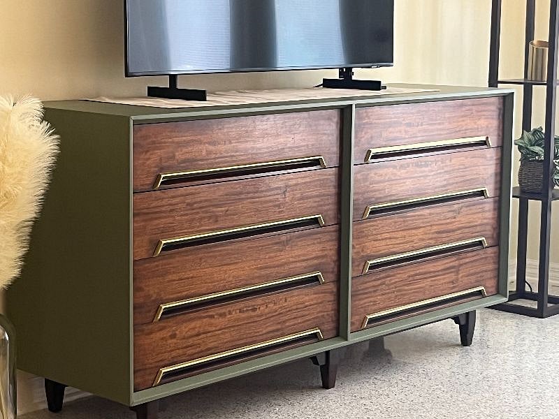 One of our vintage pieces, refinished by a local artist and custom to our home.