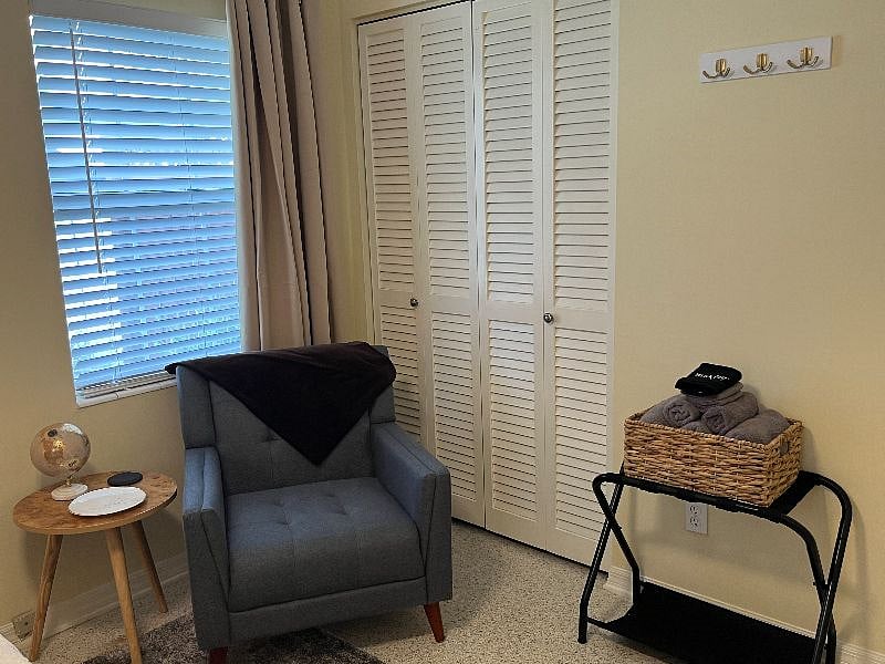 This spacious club chair is perfect for reading a book.