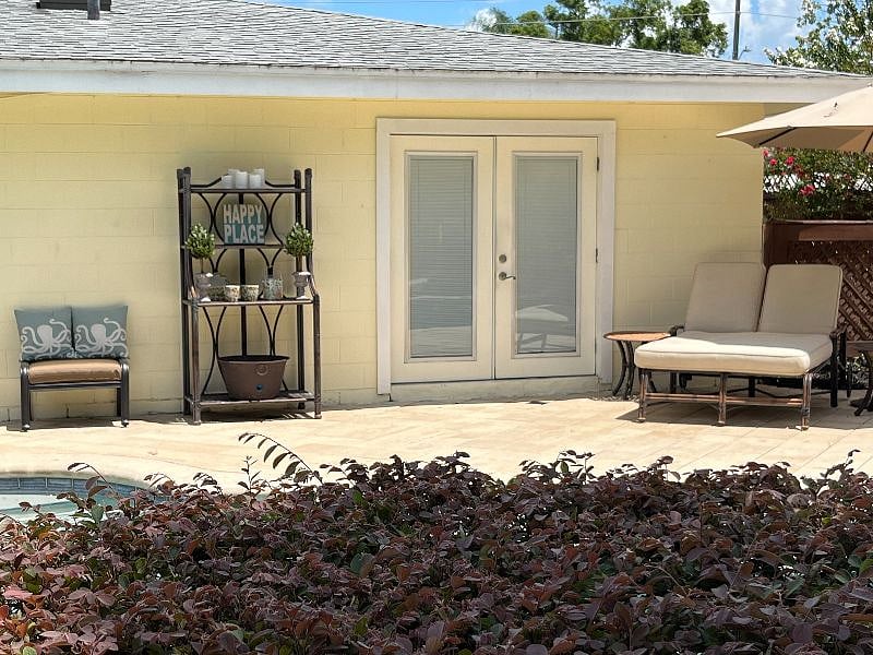 The expansive paver patio provides plenty of options for catching some Florida sunshine.