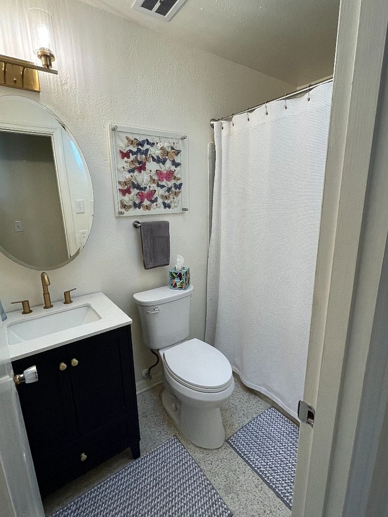 This bathroom has a large and spacious walk-in shower.