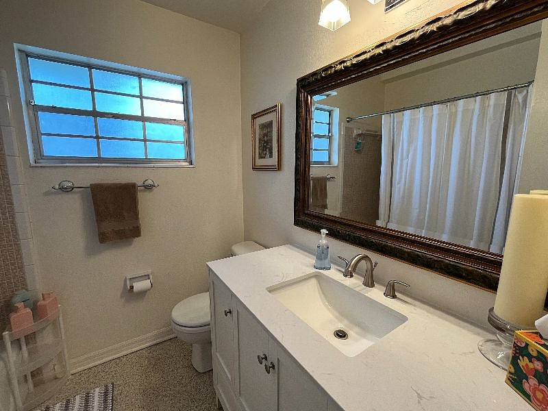 The oversized vanity allows everyone to have their own space.