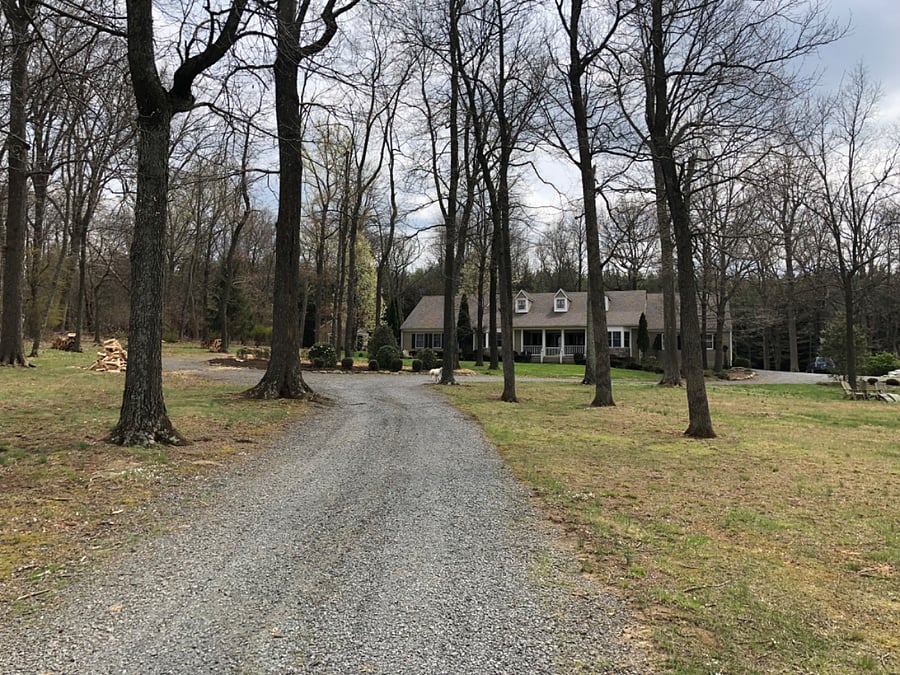 Separate driveway to left to apartment