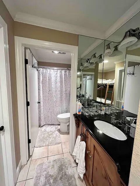 Bathroom with separate sink/vanity area.