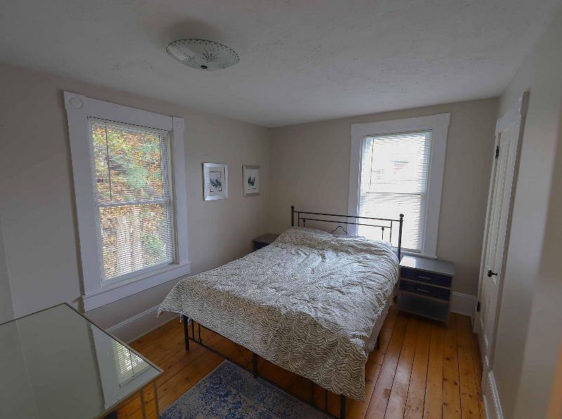 Main bedroom features queen bed and large closet