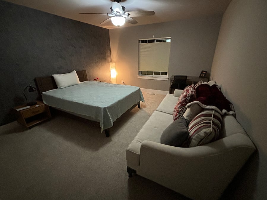 Queen room east with brand new bed, sofa & desk