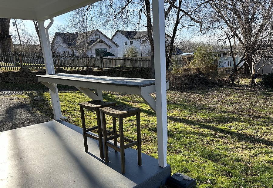 Outdoor breakfast bar and stools with great view 
