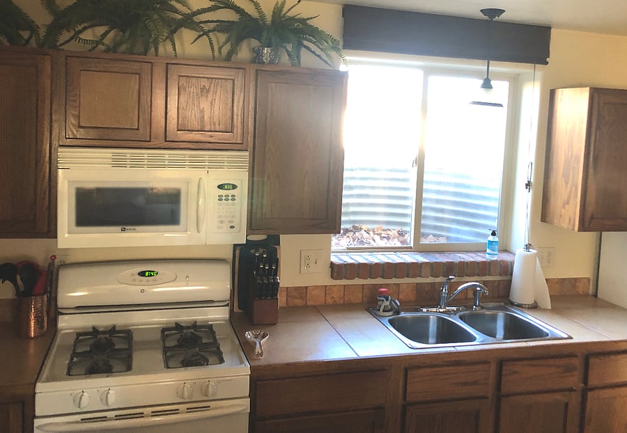 4 burner gas stove and standard sized oven.