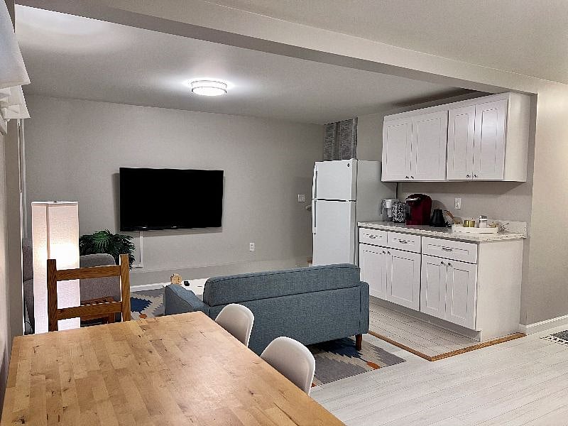 Living space with 55" Samsung TV Chromecast ready and fast 100Mbps WiFi. Sign into your personal account. Equip with a full-size fridge with freezer