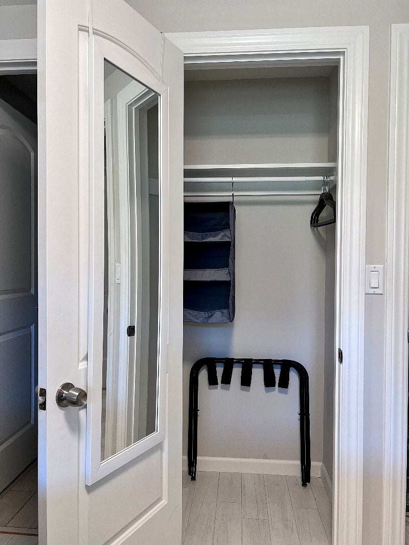 Bedroom 1 closet with full length mirror
