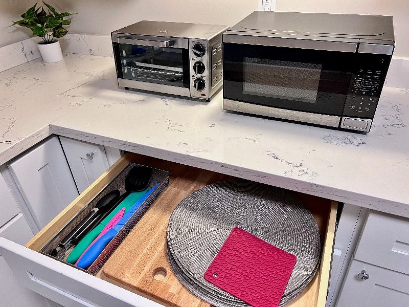 Kitchenette includes microwave and toaster oven.