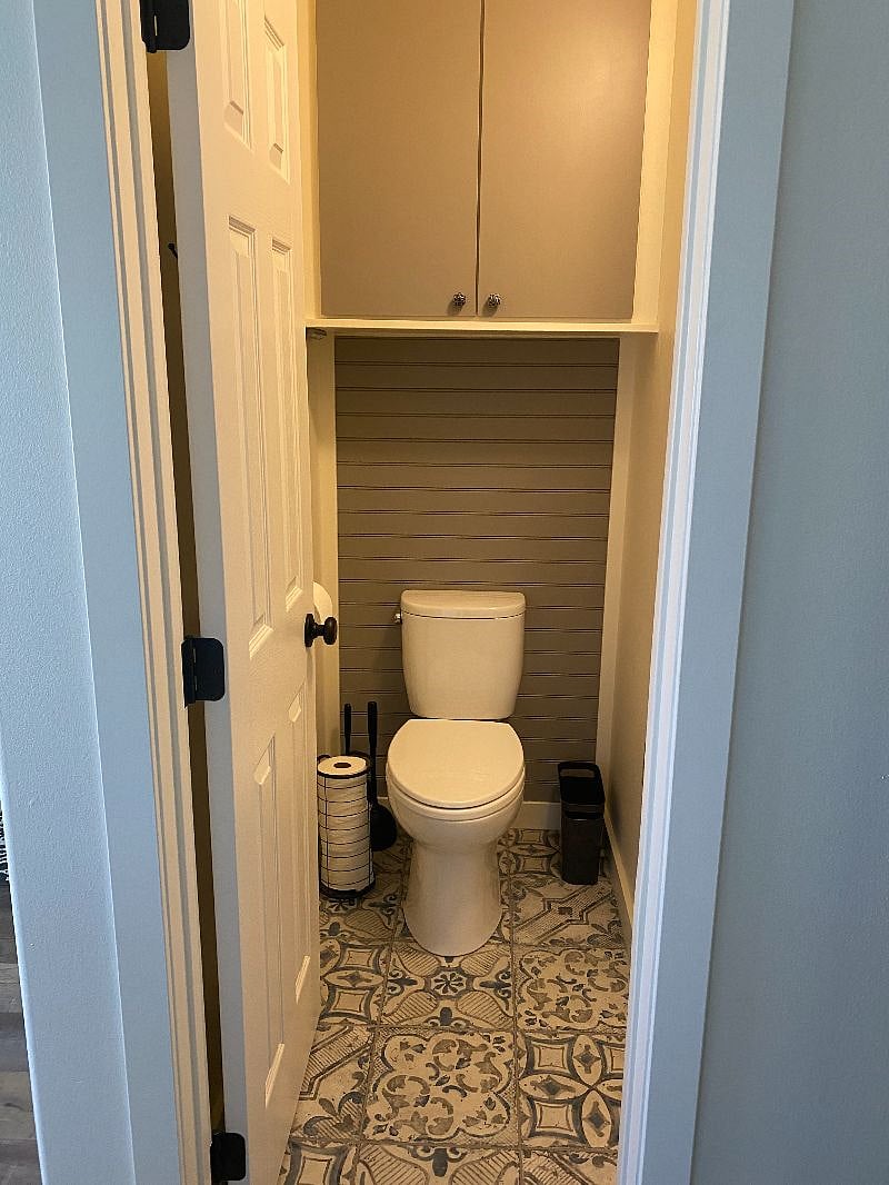 Large cabinet above toilet