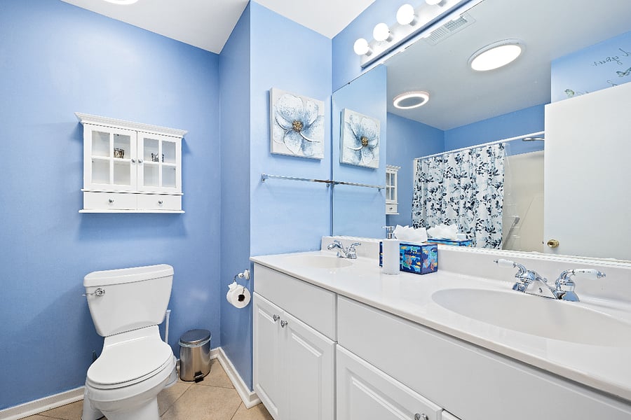 Full bath with tub and shower and double sink