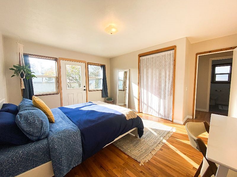 Bedroom | Queen Bed | Laptop-Friendly Workspace | En-Suite Deck Access