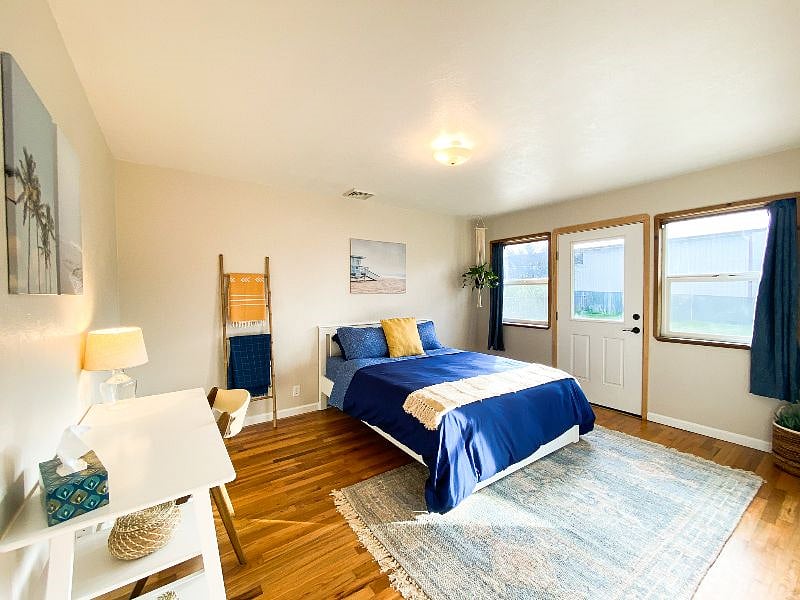 Bedroom | Queen Bed | Laptop-Friendly Workspace | En-Suite Deck Access