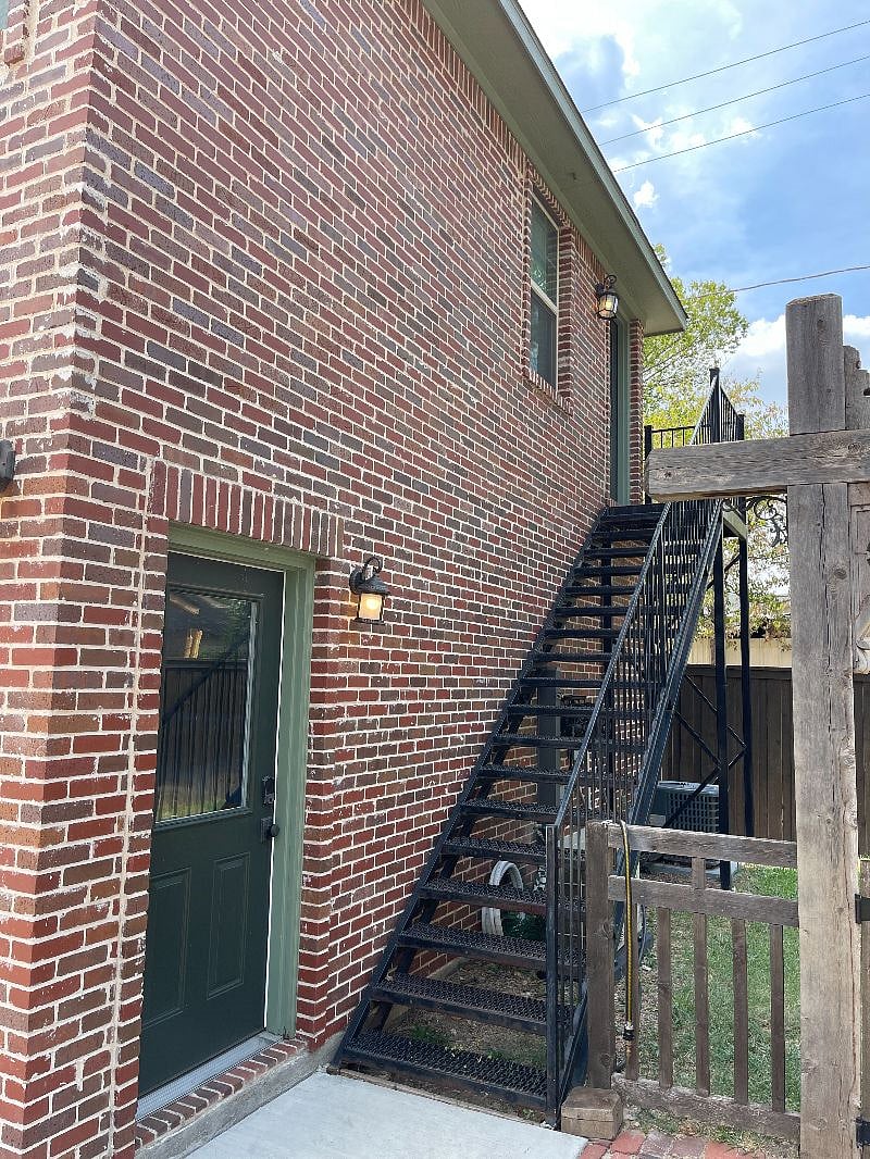 Stairs to Unit (Lit at Night)