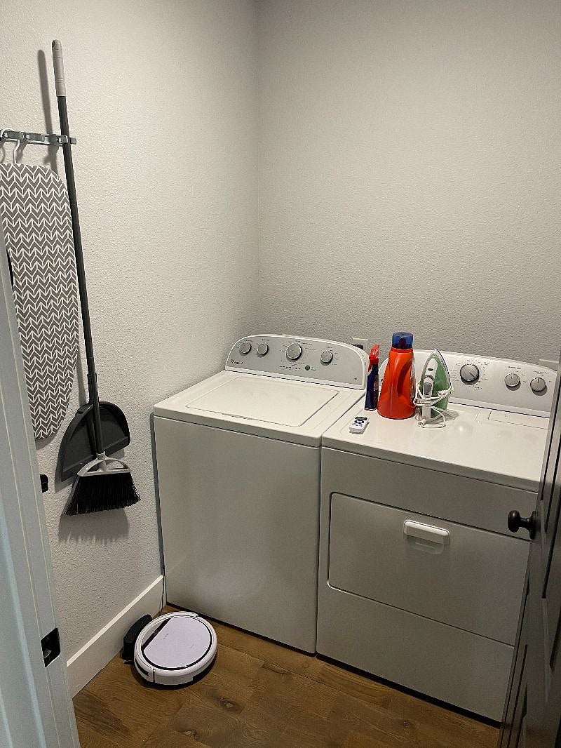 Laundry Room in Unit with Robot Vacuum