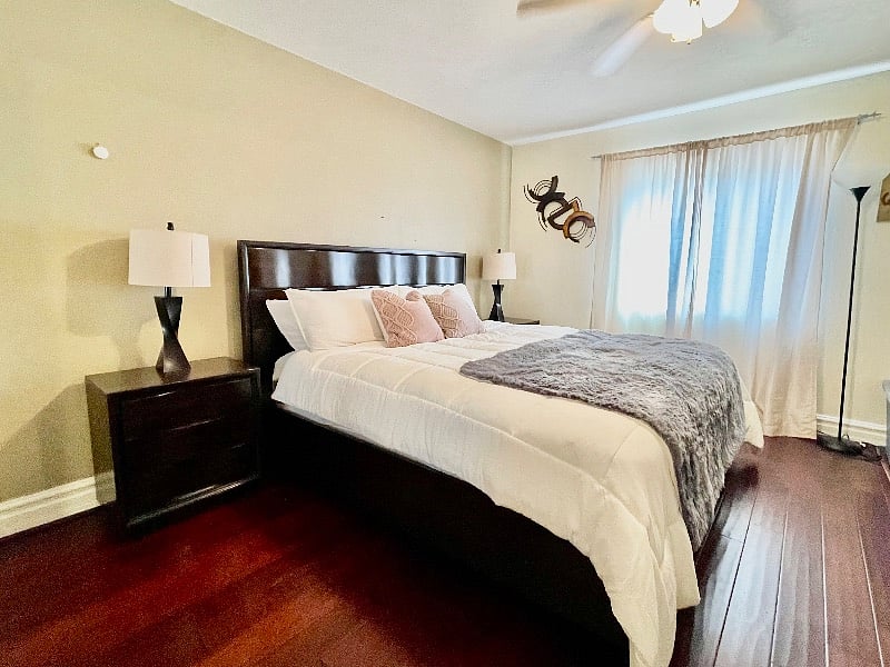 King bed with extra drawers storage at the foot of the bed