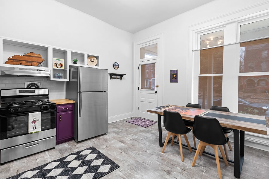 The bright light filled kitchen opens up on to the front porch, giving you private outdoor living space to enjoy.