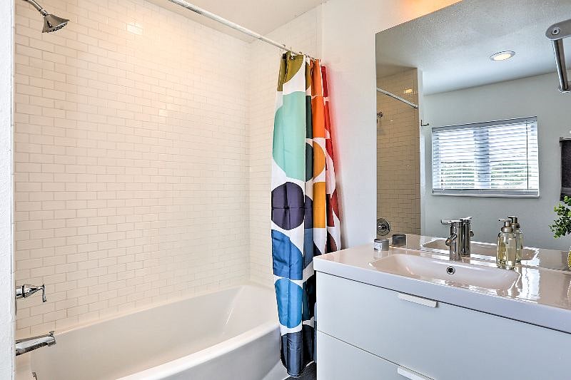 Full bath features heated floors, perfect for Denver winters.