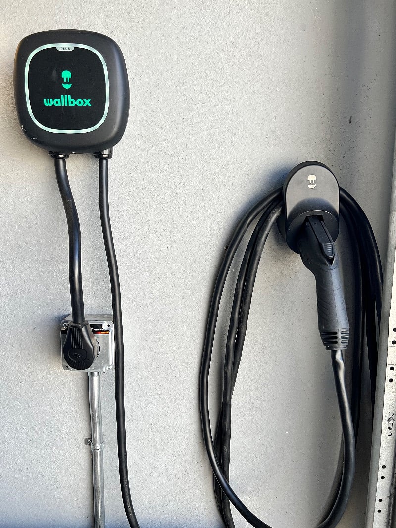 Garages 240v Level 2 EV charger: Unlimited renter access, eco-friendly convenience.
