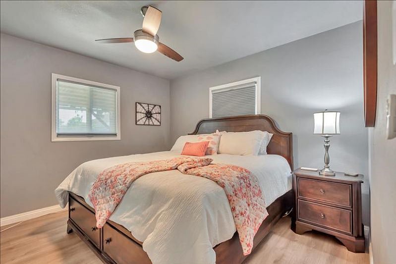 Primary Bedroom: King bed, ensuite, blackout shades, smart TV, closet, 5-drawer chest. Your peaceful retreat.