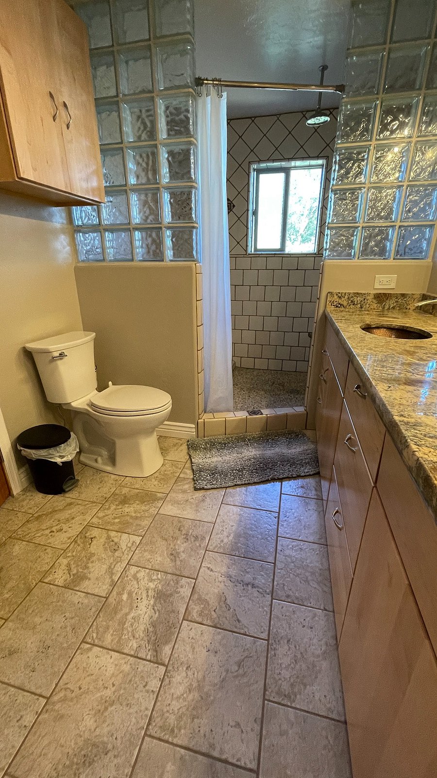 Master bathroom with tub and shower