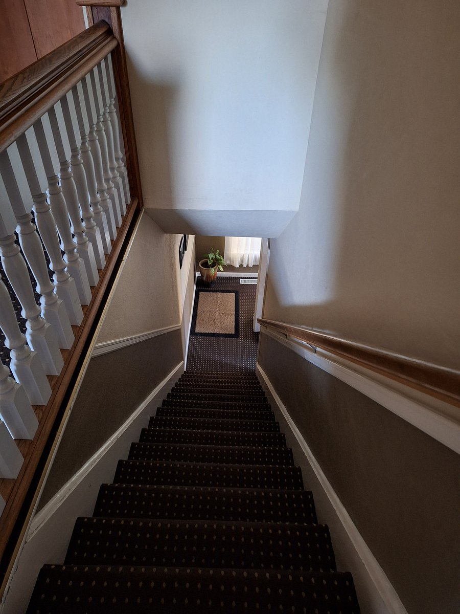 Stairway to entrance landing