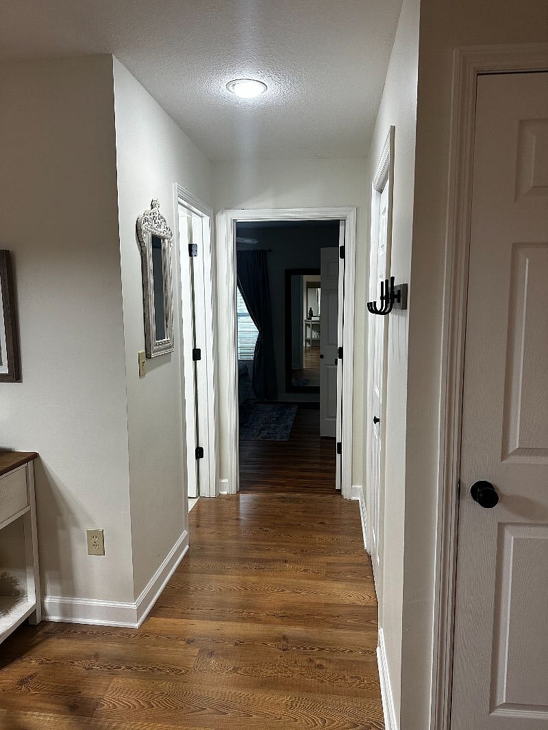 Hallway to downstairs bathroom and bedroom.