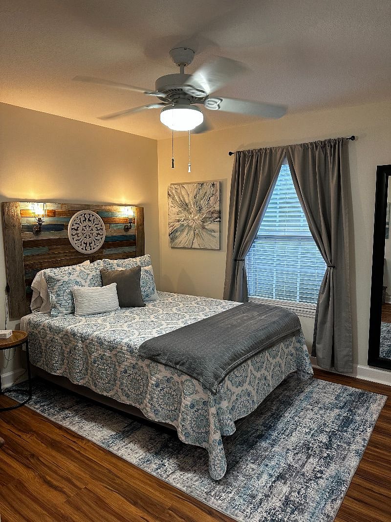 Downstairs bedroom with room darkening curtains.