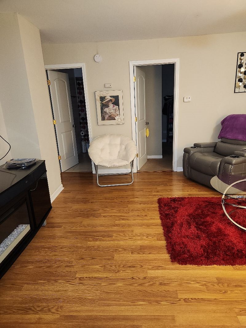 The door on the right is to the bedroom and the door on the left is to the private bathroom. Both are right off of the family room. 