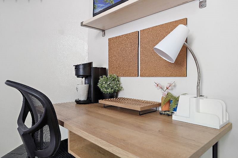 With a private workspace, personal TV and vibrant artwork, this bright and airy unit has everything you need for stays short and long.