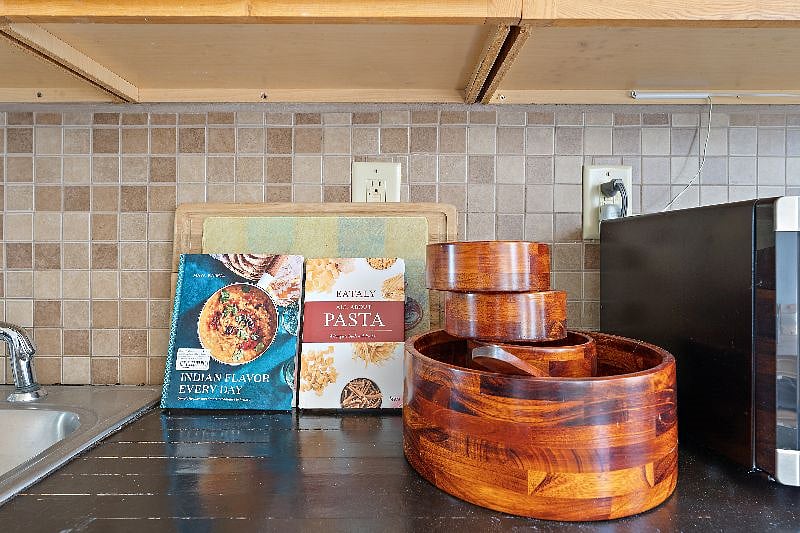 Full kitchen with utensils, flatware, silverware and everything you need to cook and enjoy a meal together.