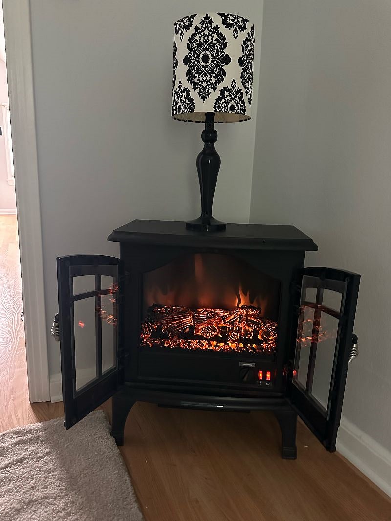 Bedroom;
Electric Fireplace :
Enjoy a relaxing atmosphere or use as a Supplemental Heat source.
**Supplemental AC unit also provided during the summer months.