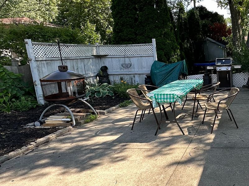 Patio with Fire Pit ;
Quiet place to Relax and sit by a fire .