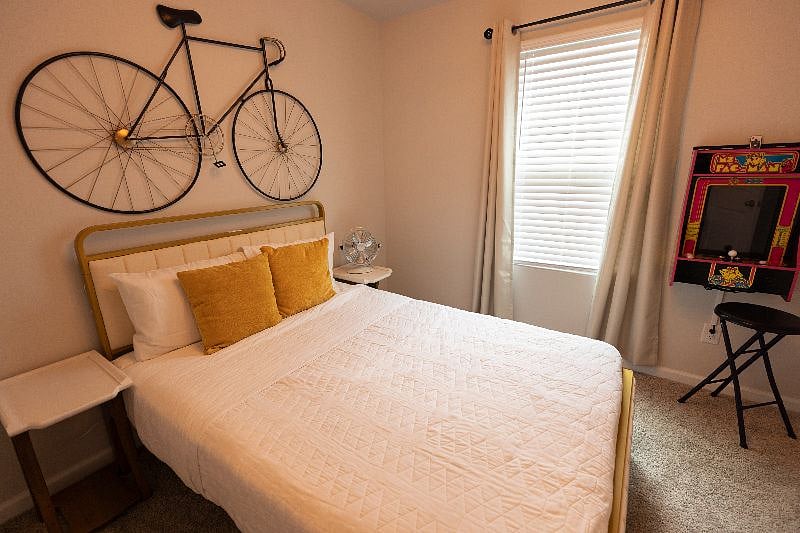 Full Size Bed with Smart TV and Pacman Game Console