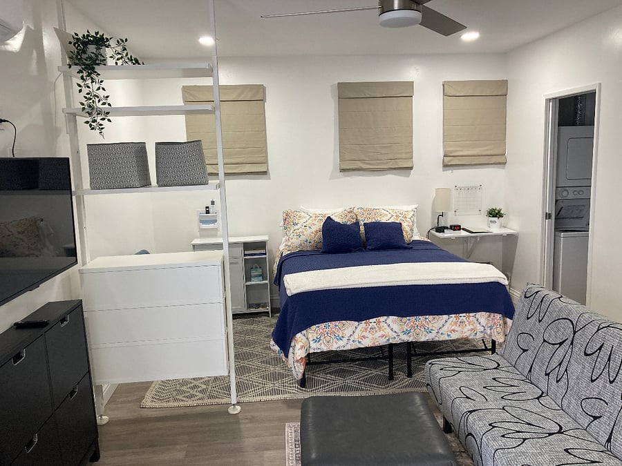 Bedroom area with queen bed